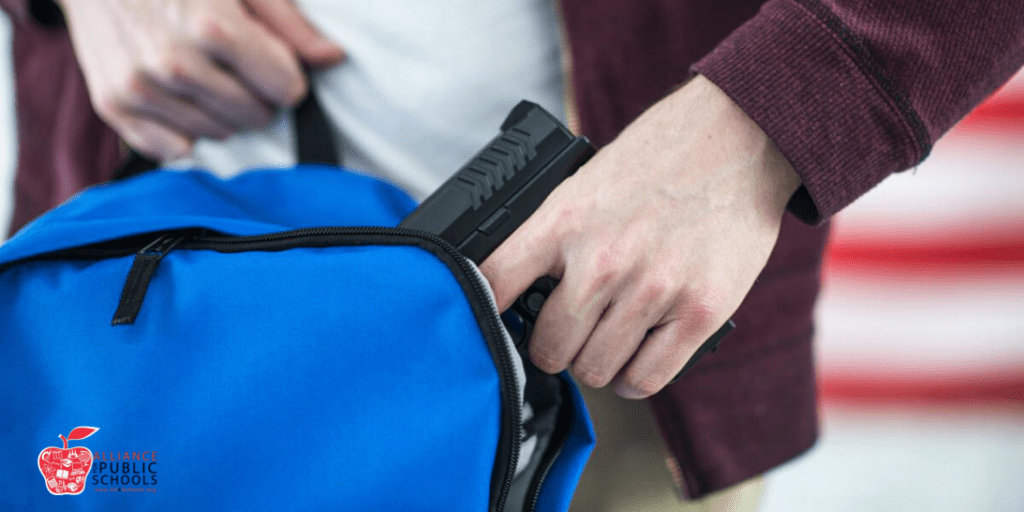 picture of gun in backpack