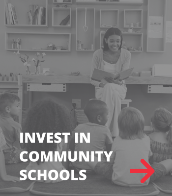 photo of teacher with children "invest in community schools"