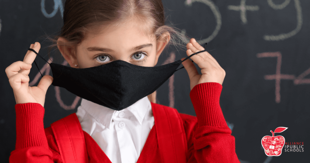 Girl with a mask and a backpack