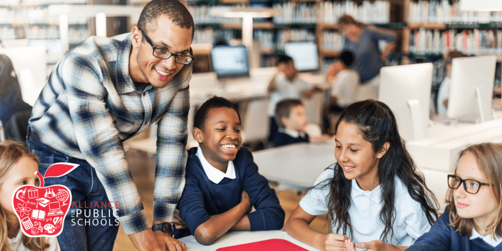 photo of teacher with students